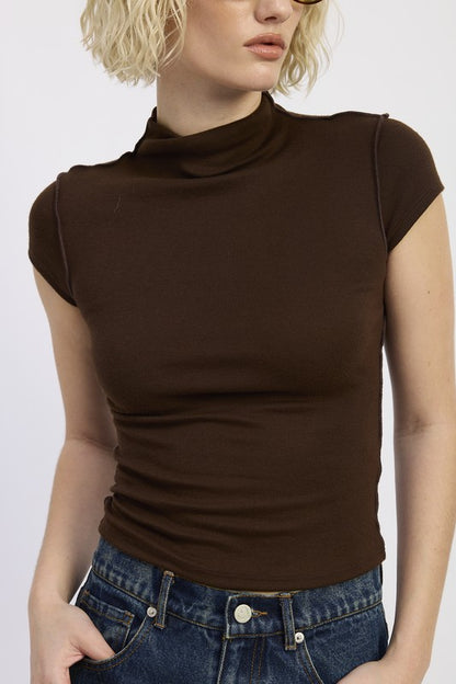 Exposed seams give edgy contrast detail and design interest. 