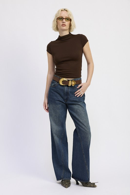 Relaxed fit, modeled by someone 5'9" wearing size Small, so it drapes nicely. 