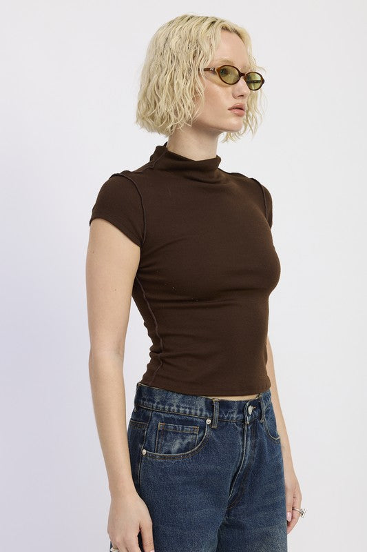 Minimalist style that pairs easily with jeans, skirts, or leather bottoms. (Styling suggestion)