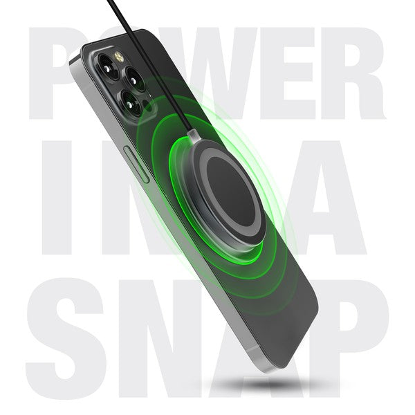 A MagSafe-compatible Naztech wireless charger magnetically attached to an iPhone, connected via USB-C for fast charging.