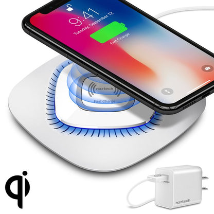 A black Naztech wireless charging pad with a glowing blue ring, actively charging a smartphone via Qi technology. Includes a USB wall adapter.