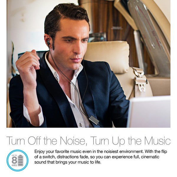 Man in luxury airplane cabin wearing in-ear headphones—promotes noise cancellation and up to 8 hours of immersive, cinematic sound.