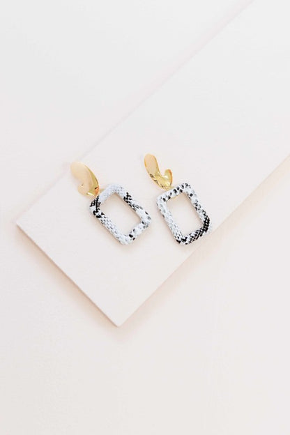 Glamour that moves with you. These Night Out Dangle Earrings are designed to sparkle under city lights and candlelit dinners alike. With a sleek silhouette and shimmering finish, they’re the perfect accessory for date nights, parties, or any moment you want to shine.