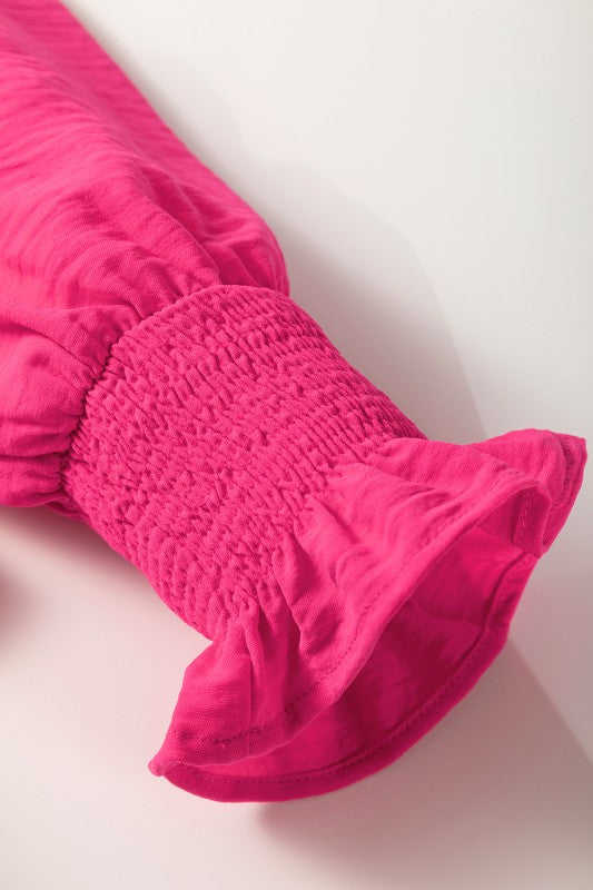 Can be styled tucked in for polished looks or untucked for a relaxed vibe. (Styling suggestion) 