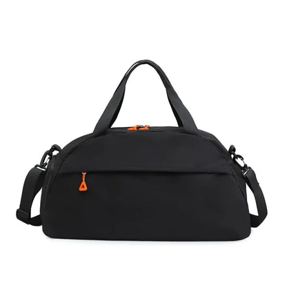 Black duffel bag with orange zipper pulls, featuring short handles and a long adjustable shoulder strap. Sleek and functional design with a front zippered pocket—great for gym, travel, or everyday use, with a pop of color for added style.