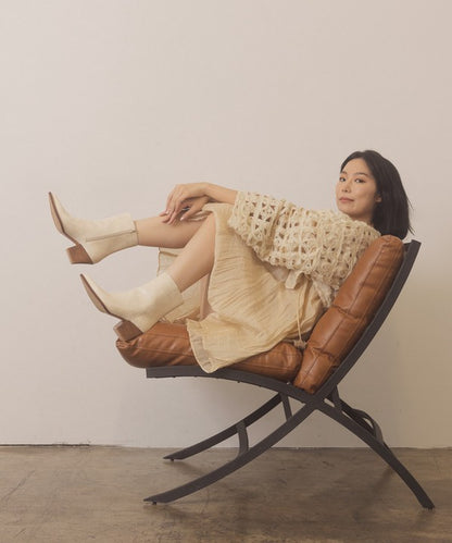 Leather ankle boots with square toe, stacked wooden block heel, side zipper closure, and slip-on style