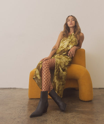 Leather ankle boots with square toe, stacked wooden block heel, side zipper closure, and slip-on style