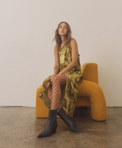 Leather ankle boots with square toe, stacked wooden block heel, side zipper closure, and slip-on style