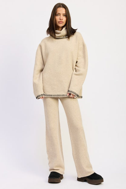 lady wearing an oversized turtle neck sweater