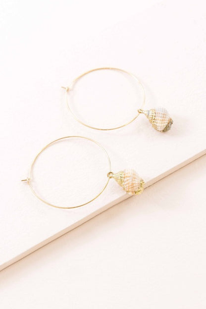 Golden hour meets ocean breeze. These Ocean Calls Hoop Earrings are a tribute to coastal calm and effortless elegance. Crafted in 14K gold-plated metal, they offer a sleek silhouette that’s perfect for beach days, sunset dinners, or simply channeling ocean vibes wherever you go.
