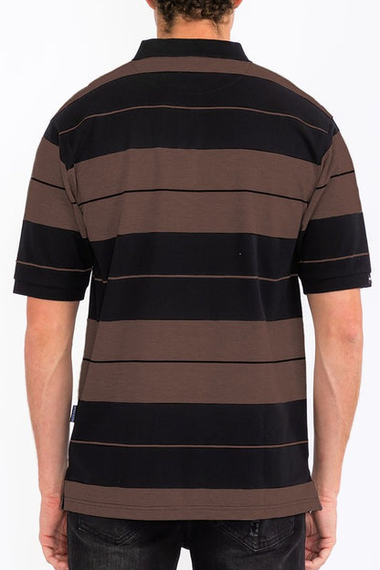 The Old School Pique Polo Shirt is a classic, breathable polo featuring a textured pique fabric, clean lines, and a timeless, versatile look suitable for casual or smart-casual wear.