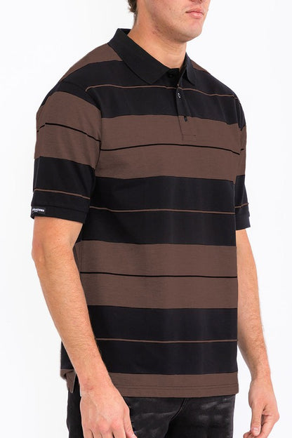 The Old School Pique Polo Shirt is a classic, breathable polo featuring a textured pique fabric, clean lines, and a timeless, versatile look suitable for casual or smart-casual wear.