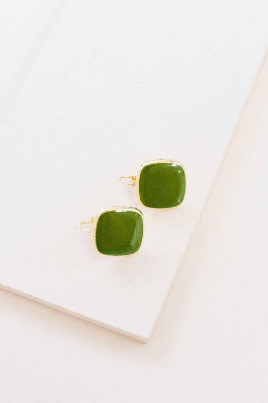 The On the Go Hook Earrings in Olive are designed for movement, comfort, and understated charm. With their sleek hook silhouette and muted green hue, they’re the perfect accessory to complement your everyday wardrobe—whether you're headed to work, brunch, or a weekend stroll.