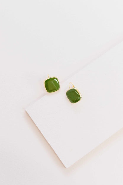 The On the Go Hook Earrings in Olive are designed for movement, comfort, and understated charm. With their sleek hook silhouette and muted green hue, they’re the perfect accessory to complement your everyday wardrobe—whether you're headed to work, brunch, or a weekend stroll.
