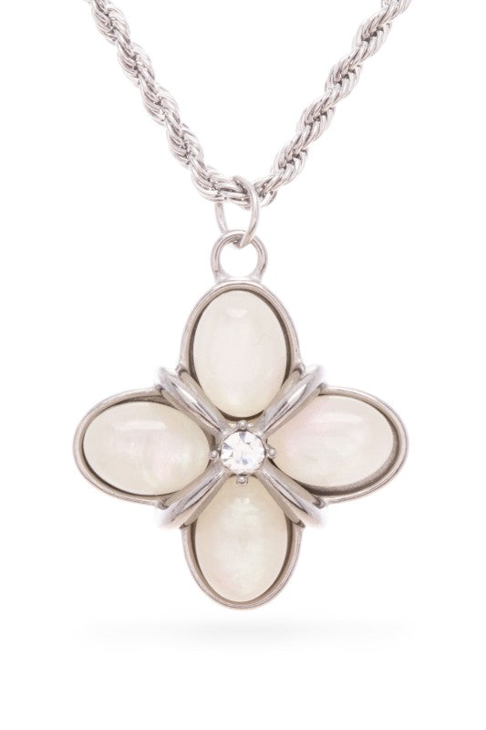 Silver necklace with a flower-shaped pendant. The pendant has five oval-shaped white stones arranged like petals around a small diamond in the center.