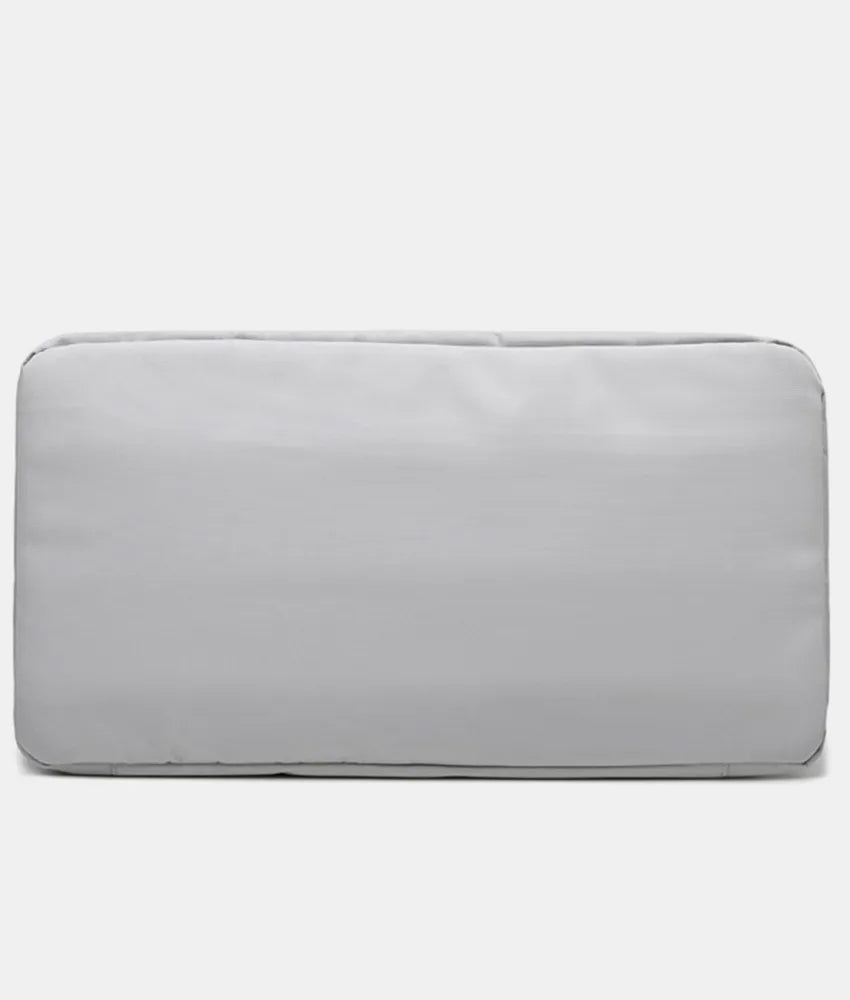 Light gray cushion with smooth fabric and rounded edges, designed for seating or back support. Minimalist and versatile—suitable for indoor or outdoor furniture.