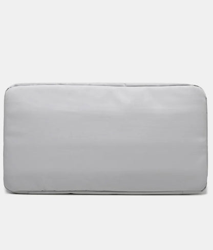 Light gray cushion with smooth fabric and rounded edges, designed for seating or back support. Minimalist and versatile—suitable for indoor or outdoor furniture.