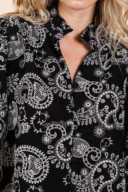 Perfect for layering under jackets, the eyelet lace adds interest even when partially covered.