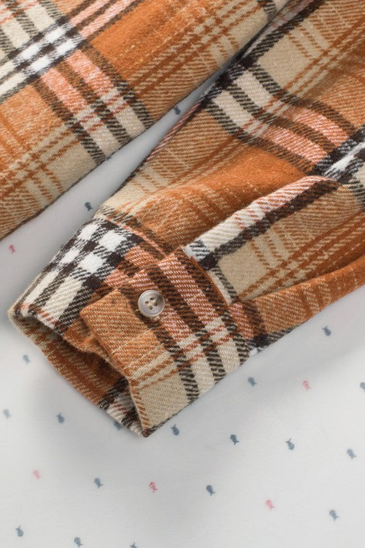 Button-front closure makes it versatile to wear open or closed. 