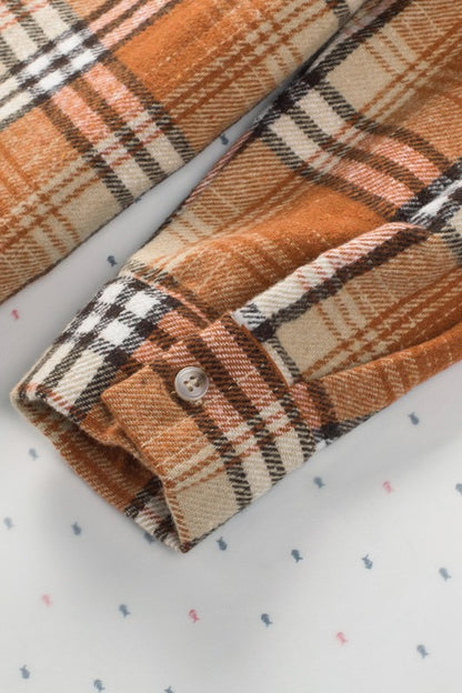 Button-front closure makes it versatile to wear open or closed. 
