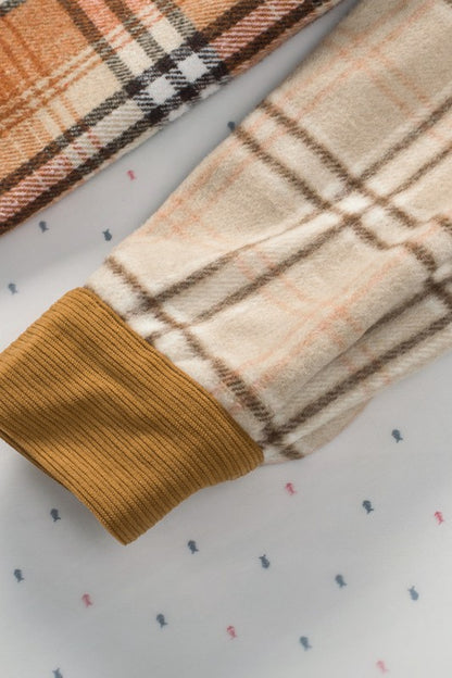 Long sleeves and comfortable fit make it ideal for layerable cool weather looks. 