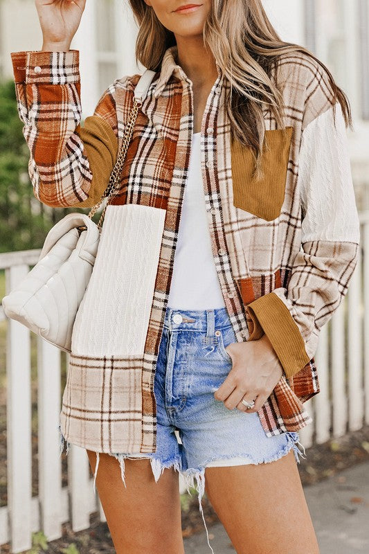 Color-block patchwork plaid gives this shacket a bold, eye-catching style. 