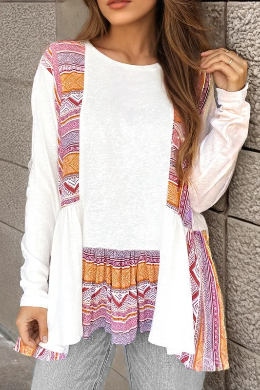 Tunic length gives extra coverage and styles beautifully with leggings or jeans. 