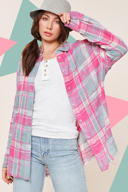 Button‐down front paired with cut-edge cuffs and raw hem for a casual, lived-in style. 