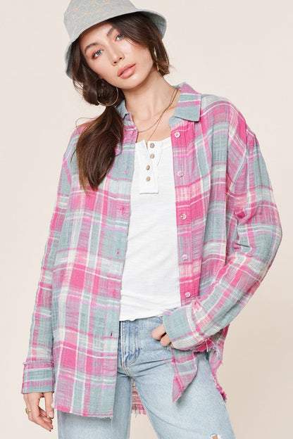 Bold plaid print with a relaxed, oversized fit for easy layering. 