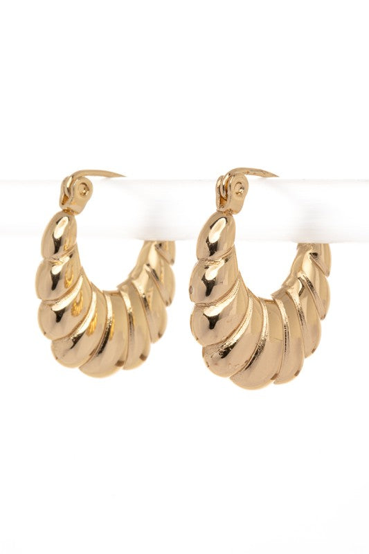 Gold hoop earrings with a twisted rope design, featuring rounded spiral segments for a textured, dimensional look, classic, elegant, and perfect for everyday or dressy wear.