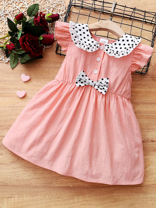 Baby girl pink dress with flutter sleeves, soft knit fabric, and delicate detailing — charming outfit for special occasions

