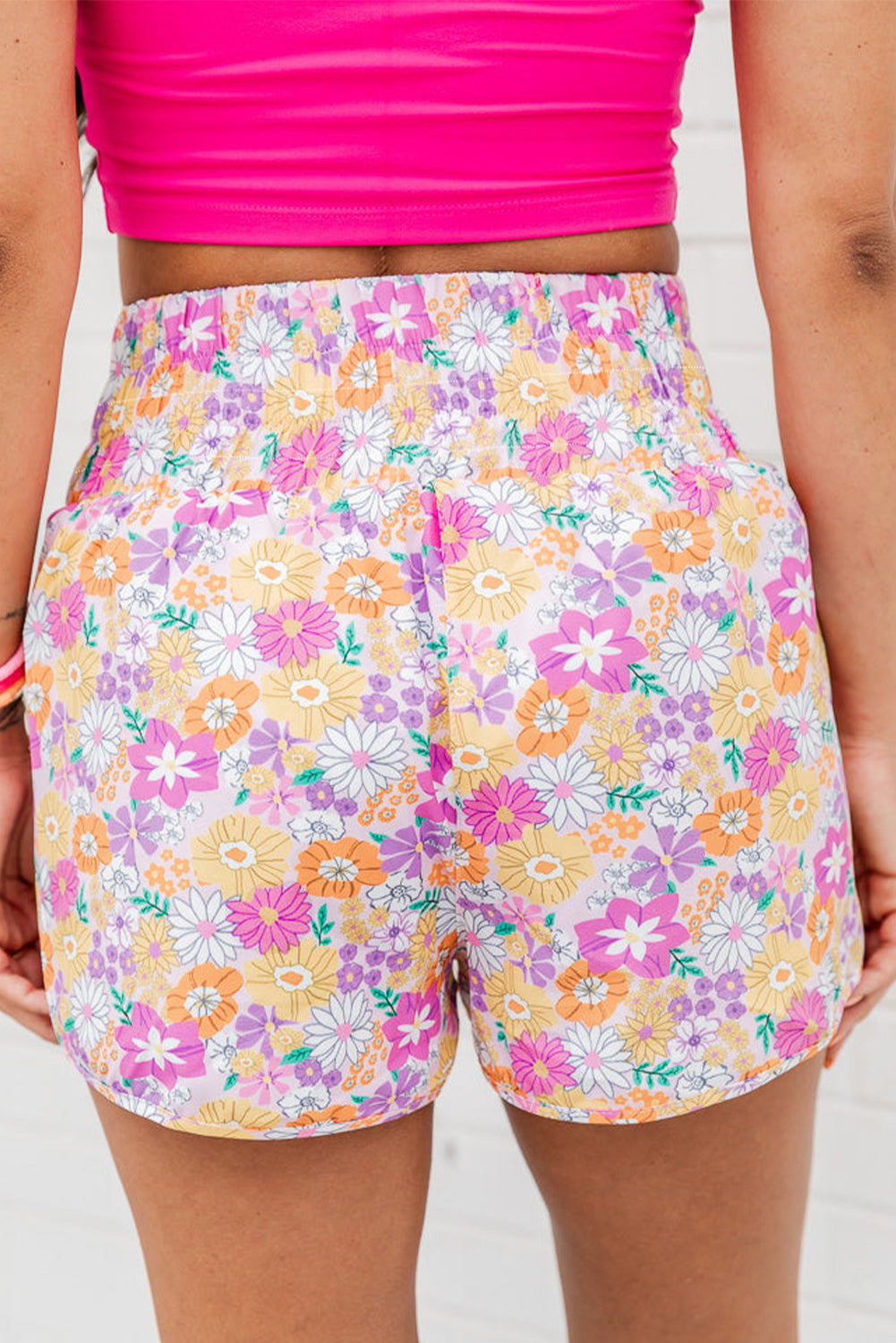 Floral, flirty, and free-spirited. These pink boho shorts are your go-to for warm-weather adventures, featuring a shirred high waist and a relaxed fit that flatters every curve. Whether you're headed to a beach day, brunch, or a music festival, these shorts bring effortless style and comfort.