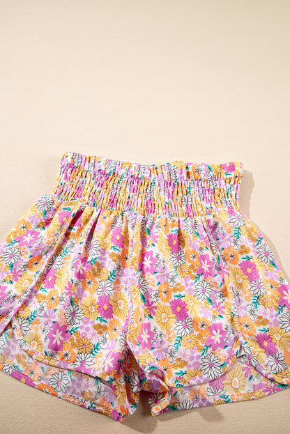 Floral, flirty, and free-spirited. These pink boho shorts are your go-to for warm-weather adventures, featuring a shirred high waist and a relaxed fit that flatters every curve. Whether you're headed to a beach day, brunch, or a music festival, these shorts bring effortless style and comfort.