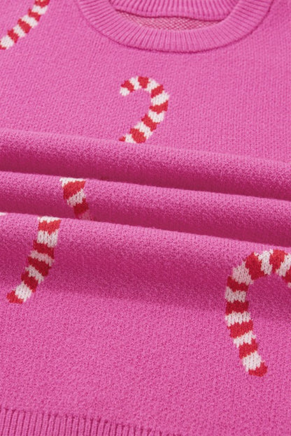 Pink candy cane patterned sweater shown