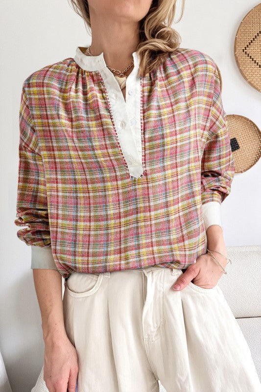 Patchwork plaid design with color-block accents for a boho chic look. 