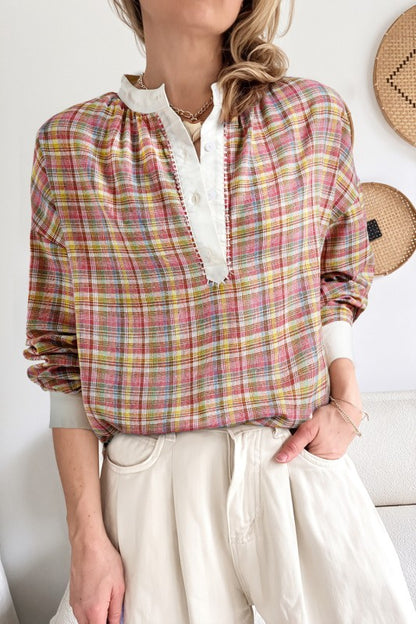 Patchwork plaid design with color-block accents for a boho chic look. 