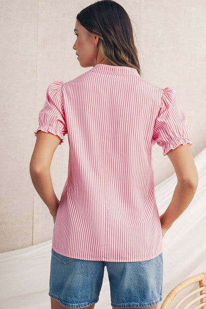 V-neckline that adds a touch of elegance and flatteringly frames the collarbone. 