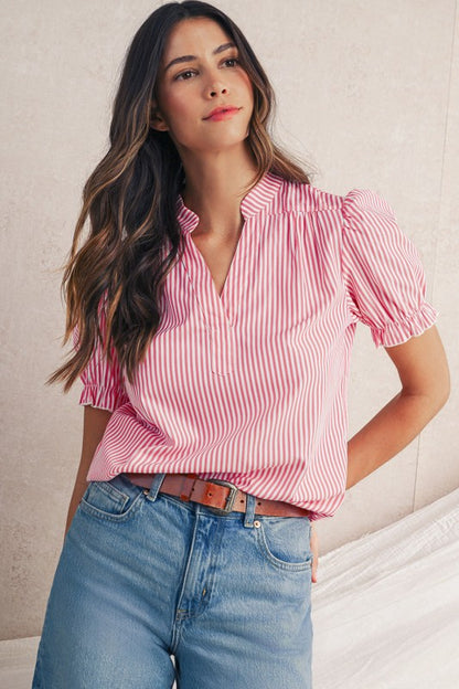 Bold pink stripe print adds fun and personality, perfect for casual or semi-dressy looks. 
