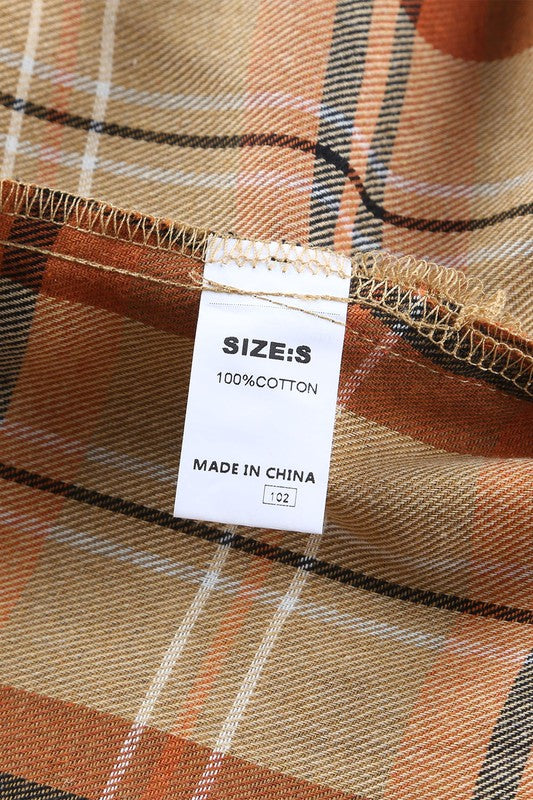 Button-down front makes this shirt easy to layer or wear open. 