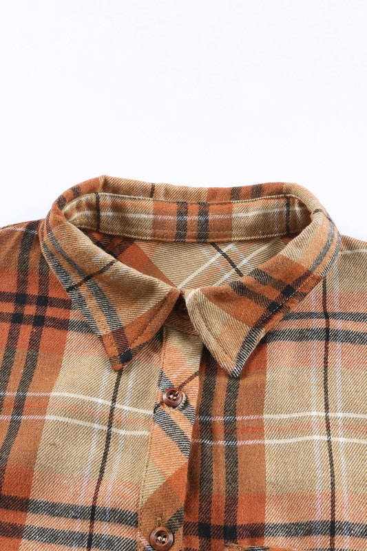 Warm color tones (like orange) enhance the plaid’s cozy feel. 