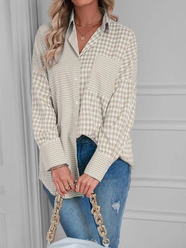 Long sleeves with cuffs to roll or secure down.