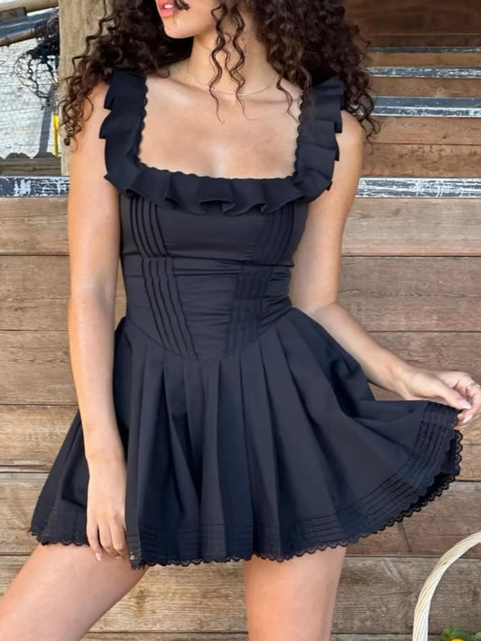 Square neck pleated mini dress with sleeveless design and structured pleats — stylish and flattering for day or evening wear