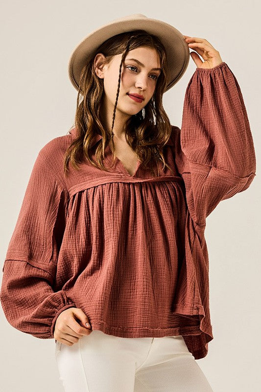 Great length to pair with leggings, jeans, or skirts — versatile bottom-wear friendly. 