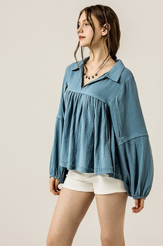 Plus-size babydoll silhouette with flowy, flattering design. 
