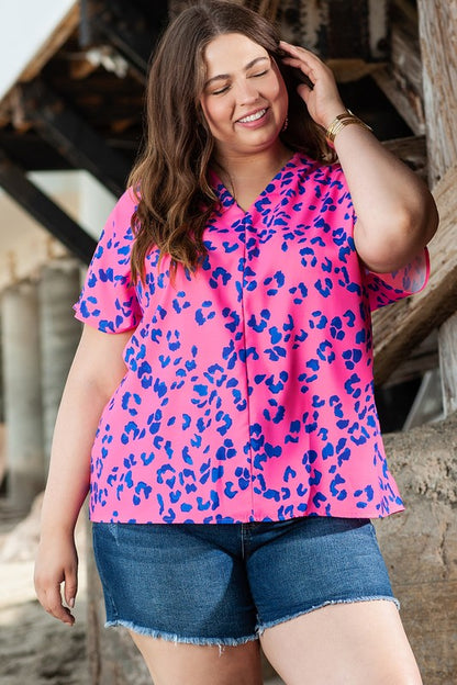 Flattering V-neckline frames the chest and elongates the neck.