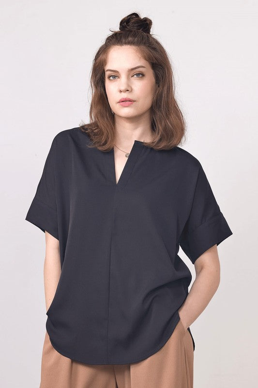Hem that falls at flattering length.