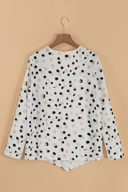 Polka dot print adds playful elegance.