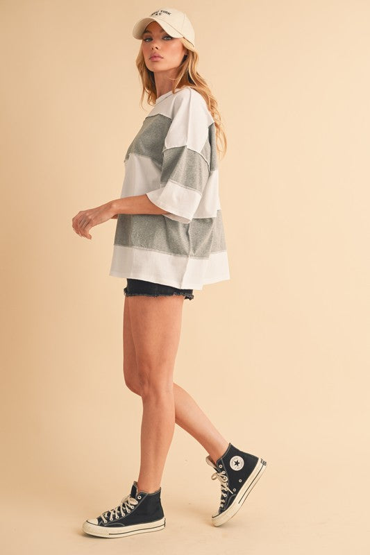 Oversized fit allows it to double as a light top layer. 