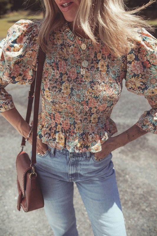 Smocked bodice offers comfortable stretch and flattering shape. 