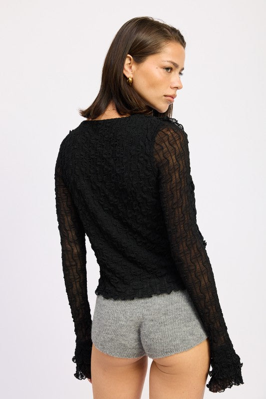 A standout blouse for those who enjoy style with comfort and delicate detailing. 